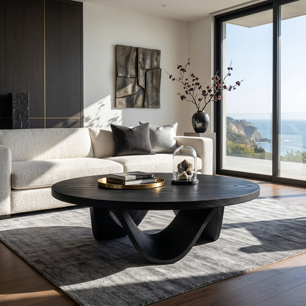 Contemporary Round Coffee Table With Continuously Curved Base For
